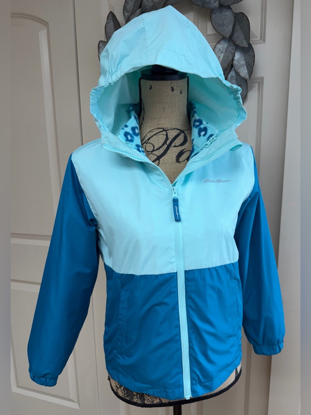 141: Eddie Bauer Two-Tone Light & Dark Blue Hooded Rain Jacket - Youth M (10/12)
